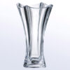 Crystal trophy with flared wavy rim and faceted sides, ideal for corporate recognition or employee achievement awards.