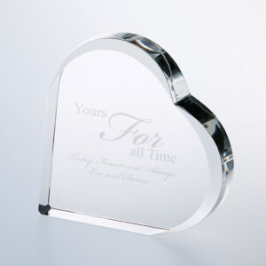 Heart-shaped crystal plaque engraved with “Yours For all Time” and names, ideal for milestones or employee recognition.