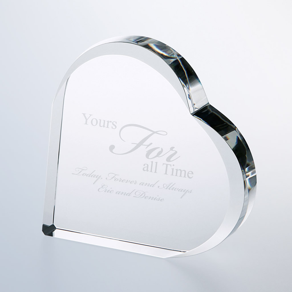 Heart-shaped crystal plaque engraved with “Yours For all Time” and names, ideal for milestones or employee recognition.