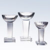 Crystal trophy cups in three heights with textured bowls and clear bases, suitable for corporate or achievement awards.