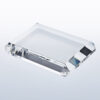 Clear rectangular crystal plaque award with beveled edges on light surface, ideal for corporate or employee recognition.
