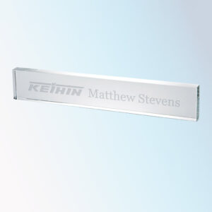 Crystal nameplate plaque with KEIHIN logo and Matthew Stevens, presented on a blue-white gradient background.