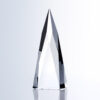 Crystal obelisk award with angular edges, upright on a reflective base; ideal for corporate or employee recognition.