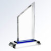 Blue sail crystal trophy with angled top, clear glass body, blue accent base; ideal for corporate or employee recognition.