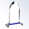 Crystal trophy with pointed arch top and blue accent, ideal for corporate recognition. Clear glass on solid base.