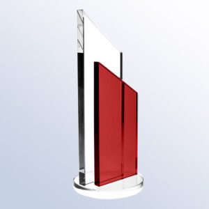 Crystal trophy with clear and red geometric acrylic panels on round base, ideal for corporate or milestone recognition awards.