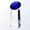 Blue diamond crystal award on clear glass pedestal, ideal for corporate recognition or employee achievement.