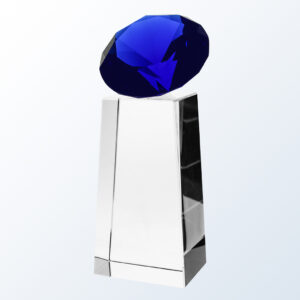 Blue diamond crystal award on clear glass pedestal, ideal for corporate recognition or employee achievement.