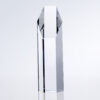Hexagon Tower crystal award trophy with faceted edges, clear material, upright on a light gray background.