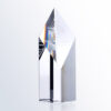 Crystal tower award with diamond-shaped top, engraved for Outstanding Customer Service, clear glass on white background.