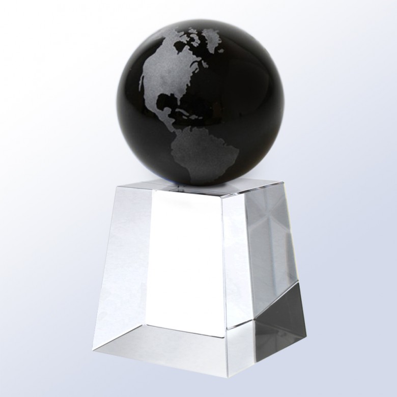 Crystal globe trophy with black and silver continents on clear glass pedestal, ideal for corporate achievement recognition.