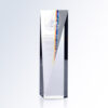 Goldwell crystal trophy with engraved text and circular logo, clear rectangular glass for corporate recognition awards.