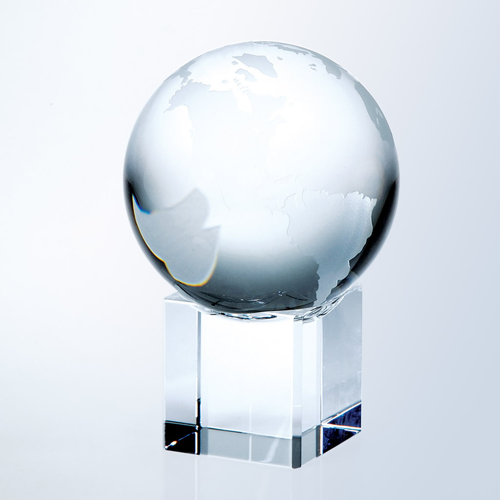 Crystal globe trophy with etched continents on a clear cube base, ideal for corporate or employee achievement awards.