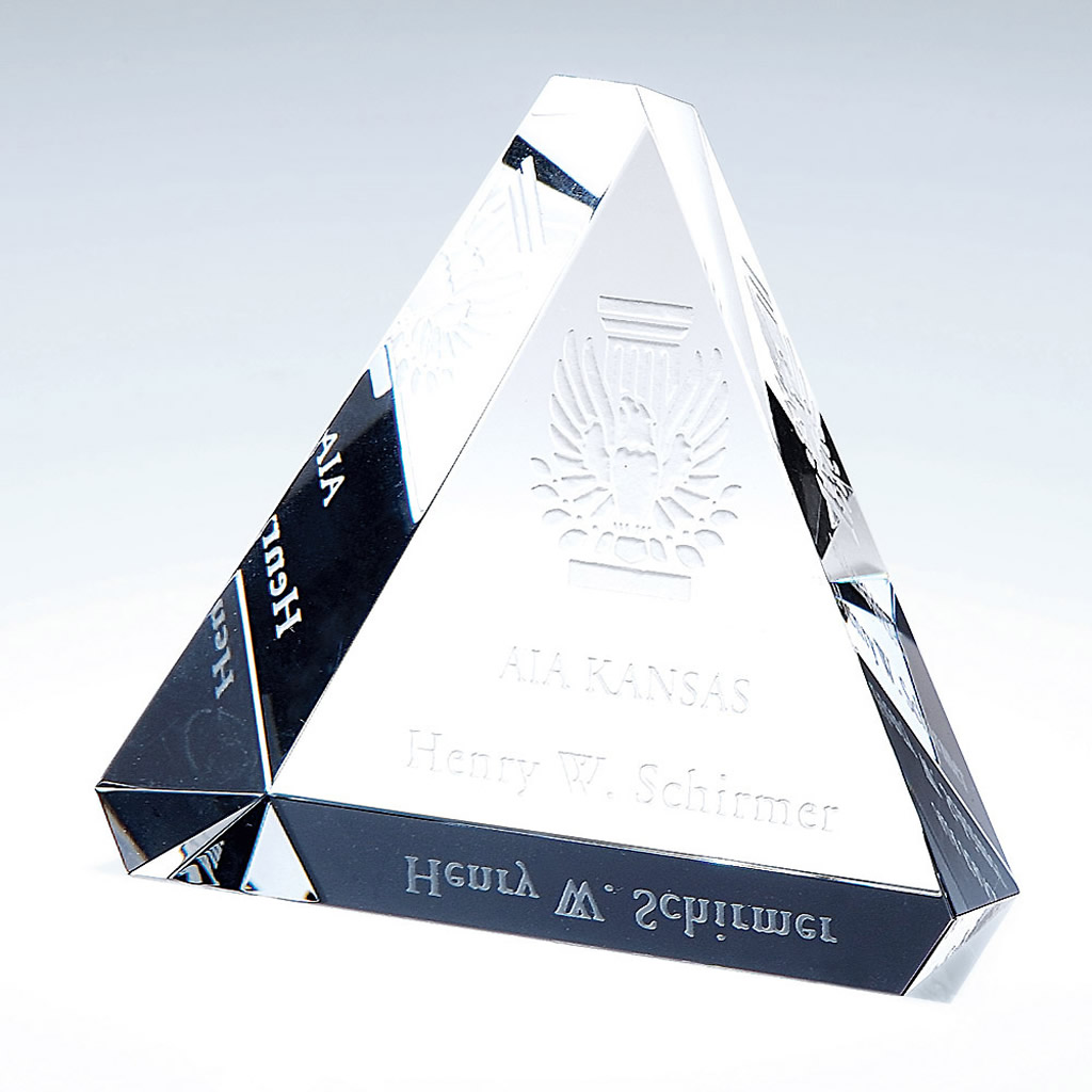 Crystal pyramid trophy with eagle emblem and AIA KANSAS Henry W. Schirmer engraving, ideal for corporate achievement.