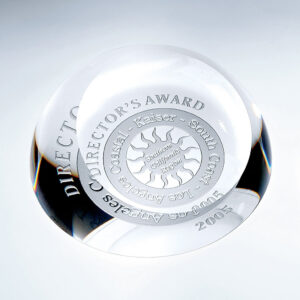 Crystal glass trophy with sun design, engraved “Directors Award, Coastal Kaiser - South Coast, Los Angeles, 2005.”.