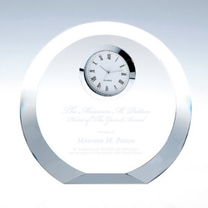Crystal desk clock award with silver rim; custom-engraved for excellence and dedication in corporate recognition.