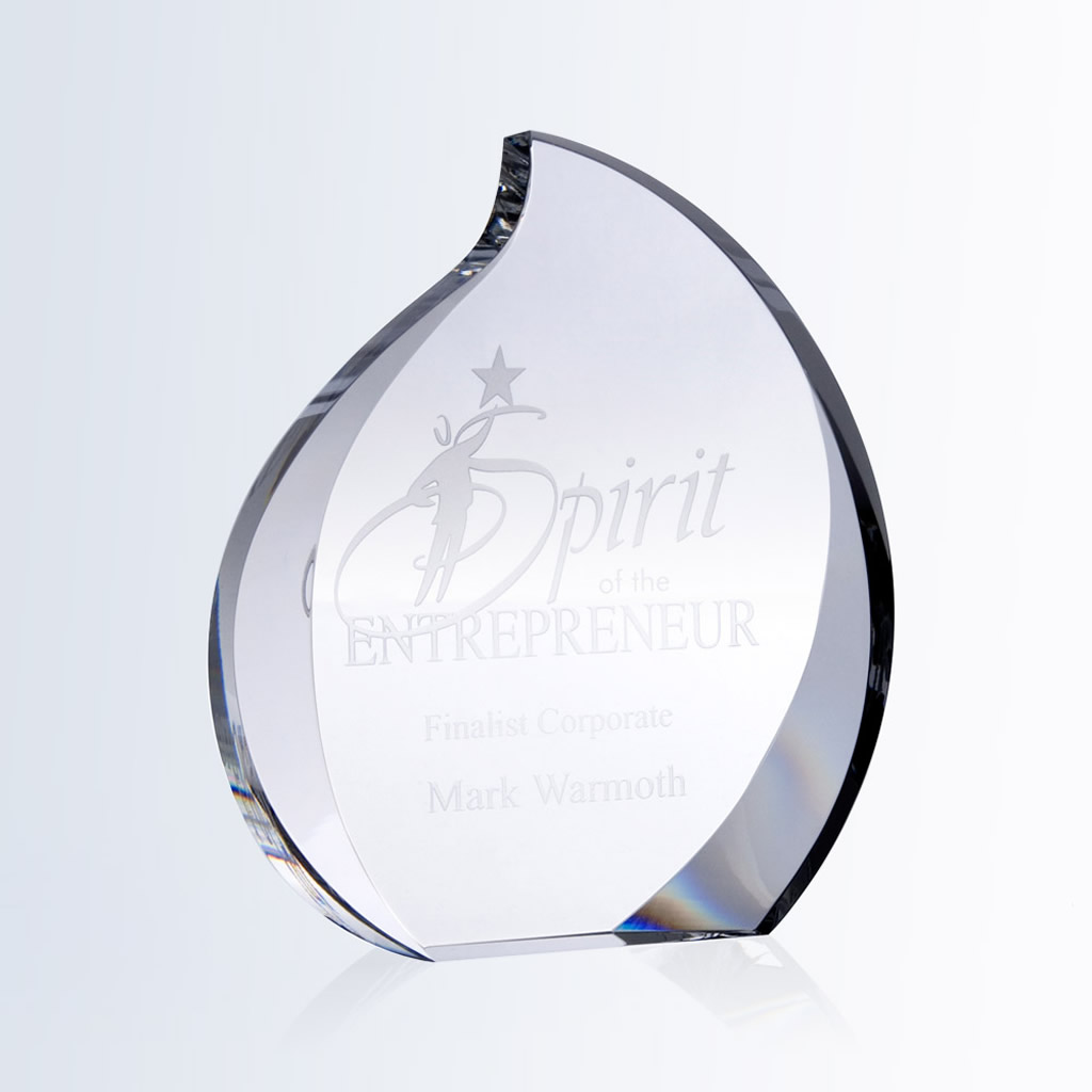 Crystal flame award with engraved "Spirit of the Entrepreneur, Finalist Corporate, Mark Warmoth" on clear glass.