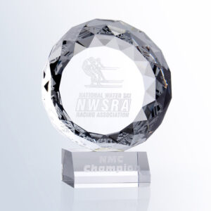 Round crystal trophy with water skiers engraving, NWSRA logo, and "NMC Champion" base—ideal for water ski racing achievement.