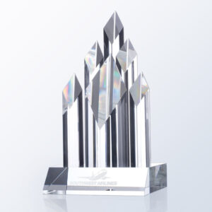 Crystal trophy with prism-shaped pillars on a rectangular base, Southwest Airlines logo engraved; ideal for corporate recognition.