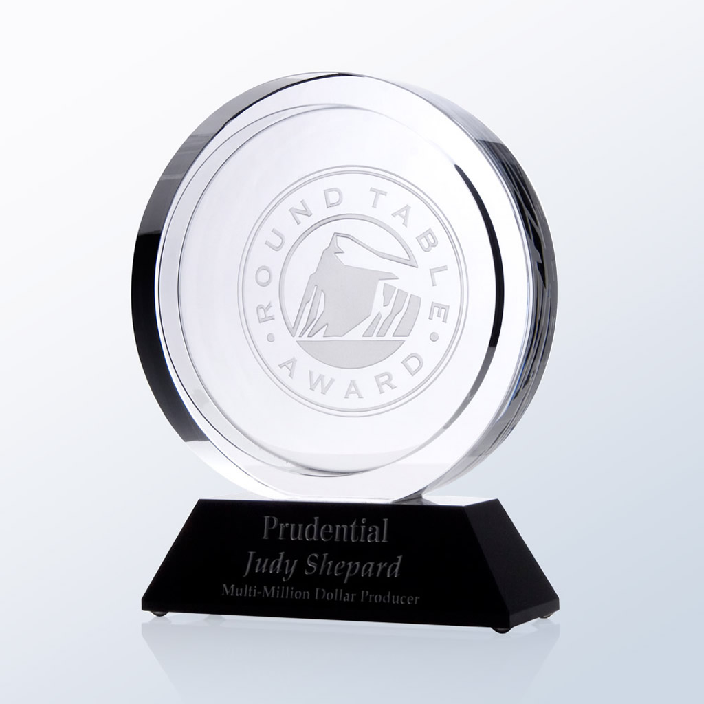 Crystal round award on black base, engraved for Prudential achievement—Multi-Million Dollar Producer, corporate recognition.