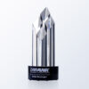 Crystal trophy with geometric facets on black base, engraved for UBANK Outstanding Achievement Award, corporate recognition.