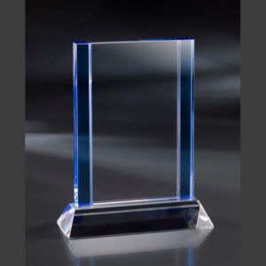 Crystal trophy with blue edges on faceted base, blank surface for engraving; ideal for corporate or employee recognition.