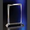 Crystal rectangular trophy with beveled edges on a glass base, ideal for corporate or employee recognition awards.