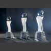 Esmeralda Crystal Awards—diamond-topped glass trophies on clear bases, ideal for corporate or employee recognition.