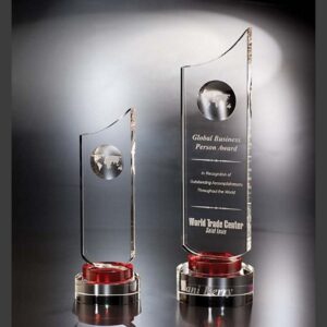 Crystal awards with red bases, perfect for corporate recognition or achievement, “Global Business Person Award” engraved.
