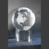 Crystal globe trophy featuring etched continents on a square glass base, ideal for corporate recognition or achievement awards.