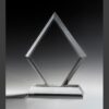 Diamond-shaped crystal award trophy with beveled edges on a rectangular glass base, ideal for corporate recognition.