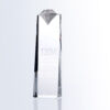 Crystal diamond tower award with “IBM” and “Angela Clarke” engraving, displayed on white; ideal for corporate recognition.