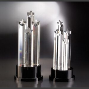 Crystal star awards with transparent pillars on black bases, ideal for corporate recognition or employee achievement.