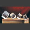 Cube crystal trophies in various sizes on a leather case, ideal for corporate or employee recognition awards.