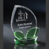 Crystal trophy with green accents, engraved for Employee of the Year, corporate recognition, glass material.