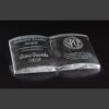 Crystal book-shaped award engraved with Industry Leader Award, recipient name, and SPCP logo on a dark background.