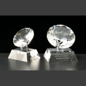 Crystal diamond awards on bases; one plain, one engraved for FedEx Employee of the Month recognition.