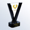 Crystal trophy with gold heart logo, VistaCare branding, and "Samuel Morrison 50 Years Service Award" plaque for corporate recognition.
