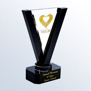 Crystal trophy with gold heart logo, VistaCare branding, and "Samuel Morrison 50 Years Service Award" plaque for corporate recognition.