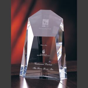Crystal award trophy with engraved text, suitable for corporate recognition or milestone achievements.