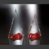 Crystal award trophies, including a red-based Soiree Crystal Award, displayed on reflective surface for corporate recognition.