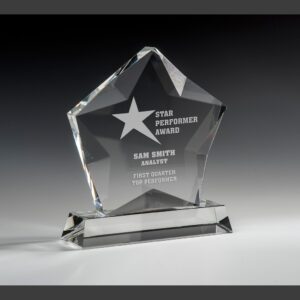 Crystal star award trophy on a rectangular base, engraved for corporate quarterly top performer recognition.