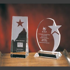 Crystal star awards featuring engraved glass plaques, ideal for corporate recognition or employee achievement events.