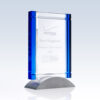 Crystal glass plaque with blue accents, silver base; corporate award for outstanding employee achievement, engraved details visible.