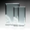 Crystal award plaques with decorative bottom corners, displayed side by side; ideal for corporate recognition or achievement.