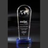 Crystal trophy with blue base, etched world map, engraved for store achievement in Meijer Weekend of Champions event.