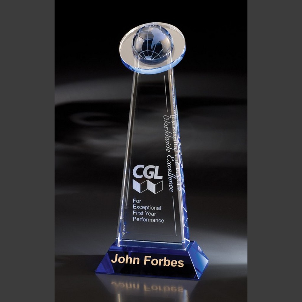 Crystal globe trophy with CGL Worldwide Excellence engraving for outstanding first-year performance, awarded to John Forbes.