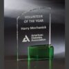 Crystal trophy with green base, engraved with VOLUNTEER OF THE YEAR and American Diabetes Association logo.