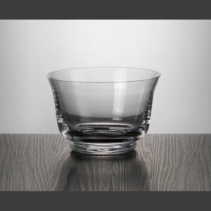Crystal trophy award with smooth, transparent finish on dark wood surface; ideal for corporate or employee recognition.
