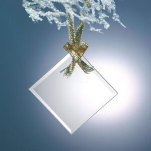 Crystal glass plaque with beveled edges, ideal for employee recognition, suspended by a gold ribbon against a blue background.